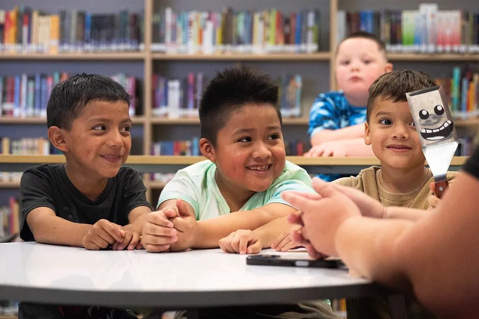 A child engaged in reading and learning